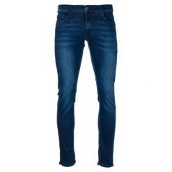 Mustang Jeansy Męskie Oregon Tapered 34/32 Ciemnoniebieskie. Niebieskie jeansy męskie z dziurami marki Mustang. W wyprzedaży za 315,00 zł.