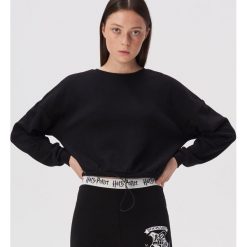 Bawełniane legginsy Harry Potter - Czarny. Czarne legginsy damskie Sinsay, s, bez wzorów, z bawełny. Za 39,99 zł.