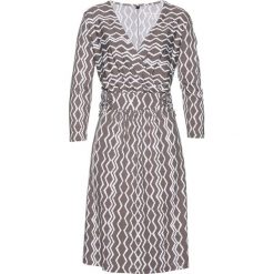 Sukienka shirtowa z nadrukiem bonprix brązowo-biały. Pomarańczowe sukienki damskie bonprix, z nadrukiem, bez kołnierzyka, bez rękawów, dopasowane. Za 44,99 zł.