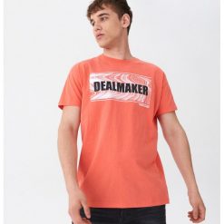 T-shirt z nadrukiem - Pomarańczowy. Pomarańczowe t-shirty męskie House, s, z nadrukiem, bez kołnierzyka. Za 39,99 zł.