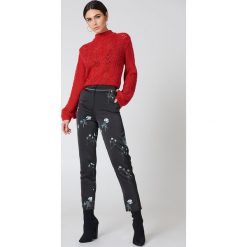 Rut&Circle Spodnie w kwiaty Natalia - Black,Multicolor. Czarne spodnie damskie marki Rut&Circle, z tkaniny. W wyprzedaży za 72,78 zł.