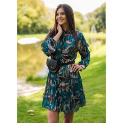 SUKIENKA SCARLETT SEA. Niebieskie sukienki damskie Fanaberia.com, na imprezę, bez wzorów, eleganckie, bez kołnierzyka, bez rękawów. Za 109,00 zł.
