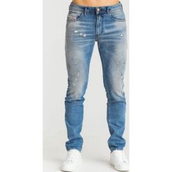 JEANSY THOMMER SLIM FIT DIESEL. Pomarańczowe jeansy męskie Diesel, m. Za 791,40 zł.