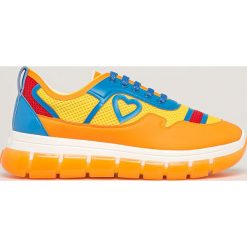 Love Moschino - Buty. Pomarańczowe buty sportowe damskie Love Moschino, bez wzorów, z materiału, sportowe. Za 929,90 zł.