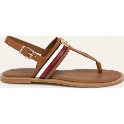 Tommy Hilfiger - Sandały skórzane. Żółte klapki damskie TOMMY HILFIGER, bez wzorów, ze skóry, bez obcasa, na obcasie. Za 399,90 zł.