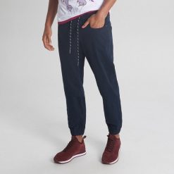 Joggery basic - Granatowy. Niebieskie spodnie męskie Cropp, s, bez wzorów. Za 79,99 zł.