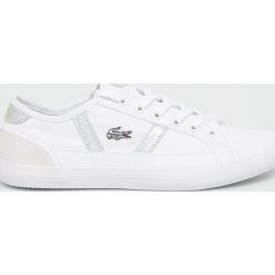 Lacoste - Tenisówki. Białe trampki i tenisówki damskie Lacoste, bez wzorów, ze skóry, na sznurówki. W wyprzedaży za 239,90 zł.