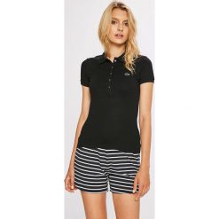 Lacoste - Top. Czarne bluzki damskie marki Lacoste, xs, bez wzorów, z elastanu, bez kołnierzyka. Za 379,90 zł.