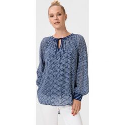 Tommy Hilfiger Maddie Bluzka Niebieski. Niebieskie bluzki damskie TOMMY HILFIGER, bez wzorów, z poliesteru, bez kołnierzyka, bez rękawów. Za 462,95 zł.