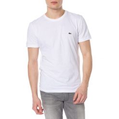 Lacoste Koszulka Biały. Białe podkoszulki męskie Lacoste, l, z nadrukiem, z bawełny, z krótkim rękawem. Za 180,95 zł.