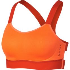 Stanik Sportowy Nike Breathe Tech Pack Medium Support Bra W Pomarańczowy. Pomarańczowe biustonosze sportowe damskie Nike, bez wzorów, z tkaniny, do biegania. Za 159,99 zł.