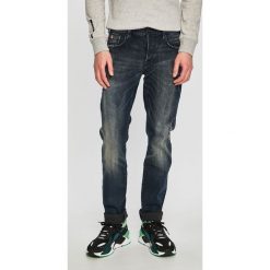 Scotch & Soda - Jeansy Ralston. Niebieskie jeansy męskie Scotch & Soda, bez wzorów. W wyprzedaży za 359,90 zł.