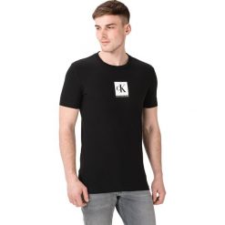 Calvin Klein Monogram Koszulka Czarny. Czarne podkoszulki męskie Calvin Klein, xxl, z nadrukiem, z elastanu, z krótkim rękawem. Za 152,95 zł.