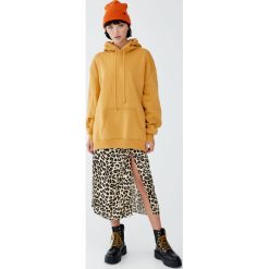 Luźna bluza z kapturem. Szare bluzy damskie Pull&Bear, bez wzorów, bez rękawów, z kapturem. Za 89,90 zł.