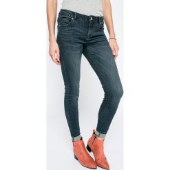 Review - Jeansy Minnie. Niebieskie jeansy damskie rurki Review, z bawełny. W wyprzedaży za 99,90 zł.