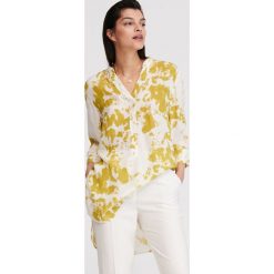 Bluzka z motywem tie-dye - Wielobarwny. Bluzki damskie Reserved, bez wzorów, bez kołnierzyka, bez rękawów. W wyprzedaży za 59,99 zł.
