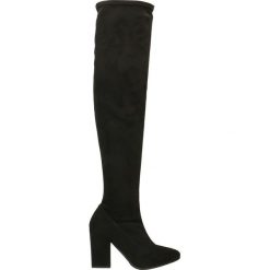 Kozaki LILIA. Czarne kozaki damskie marki Gino Rossi, ze skóry, eleganckie, na wysokim obcasie, na słupku, bez zapięcia. Za 349,90 zł.