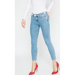 Tommy Hilfiger - Jeansy Milan. Niebieskie jeansy damskie marki TOMMY HILFIGER, z elastanu. W wyprzedaży za 479,90 zł.