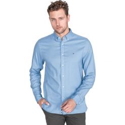 Tommy Hilfiger Koszula Niebieski. Niebieskie koszule męskie TOMMY HILFIGER, l, bez wzorów, z elastanu, bez kołnierzyka, z długim rękawem. Za 426,95 zł.