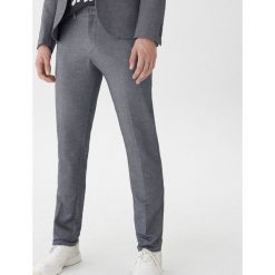Spodnie garniturowe slim fit - Szary. Szare spodnie garniturowe męskie marki House. Za 129,99 zł.