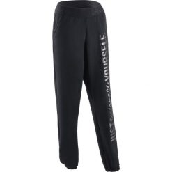 Spodnie do tańca nowoczesnego damskie. Czarne spodnie damskie DOMYOS, xs, bez wzorów, z elastanu, na fitness i siłownię. Za 79,99 zł.
