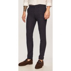 Scotch & Soda - Spodnie. Niebieskie spodnie męskie Scotch & Soda, na co dzień, bez wzorów, z bawełny, casualowe. W wyprzedaży za 499,90 zł.