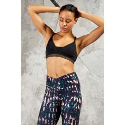 Etam - Biustonosz Charline. Czarne biustonosze sportowe damskie Etam, xs, bez wzorów, z elastanu. W wyprzedaży za 79,90 zł.