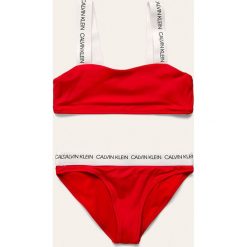 Calvin Klein - Strój kąpielowy dziecięcy 128-176 cm. Czerwone stroje kąpielowe dziewczęce Calvin Klein, bez wzorów, z elastanu. W wyprzedaży za 199,90 zł.