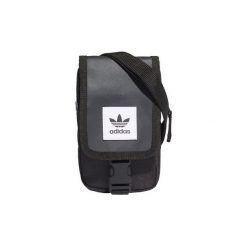 Torby / Saszetki adidas Torba typu listonoszka. Czarne listonoszki damskie Adidas, bez wzorów, bez dodatków. Za 89,95 zł.