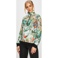 New Balance - Bluza. Bluzy damskie New Balance, s, bez wzorów, z elastanu, z krótkim rękawem, krótkie, bez kaptura. W wyprzedaży za 199,90 zł.