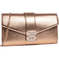 Torebka GUESS - Dazzle Mini HWBR76 75710 ROG. Żółte torebki klasyczne damskie Guess, z aplikacjami, ze skóry ekologicznej, bez dodatków. Za 399,00 zł.