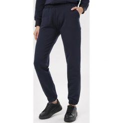 Granatowe Spodnie Felyera. Niebieskie spodnie damskie Born2be, xl, z dresówki. Za 69,99 zł.