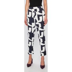 Vero Moda - Spodnie. Białe legginsy damskie Vero Moda, bez wzorów, z poliesteru, casualowe. W wyprzedaży za 89,90 zł.