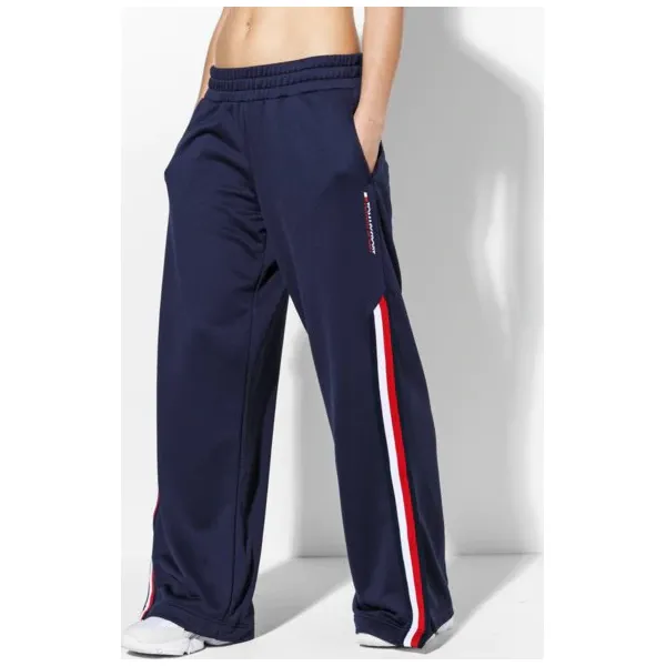 Tommy Sport Spodnie With Snaps 141 , granatowy, rozmiar S. Niebieskie spodnie damskie TOMMY HILFIGER, s, z tkaniny. W wyprzedaży za 299,99 zł.