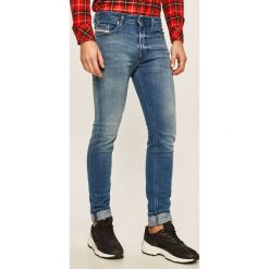 Diesel - Jeansy Thommer. Niebieskie jeansy męskie Diesel, z aplikacjami. Za 699,90 zł.