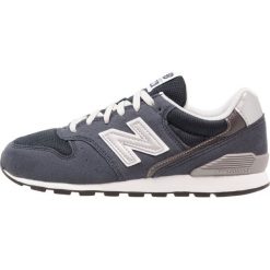 New Balance Tenisówki i Trampki navy. Szare tenisówki męskie marki New Balance, na lato, z materiału. W wyprzedaży za 247,20 zł.