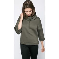 Puma - Bluza. Białe bluzy damskie z kieszeniami marki Puma, s, z bawełny, z kapturem. W wyprzedaży za 139,90 zł.