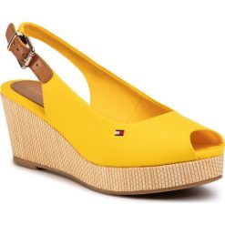 Espadryle TOMMY HILFIGER - Iconic Elba Sling Back Wedge FW0FW04788 Sunny ZEK. Żółte espadryle damskie TOMMY HILFIGER, bez wzorów, z tworzywa sztucznego, bez obcasa, na obcasie. Za 359,00 zł.