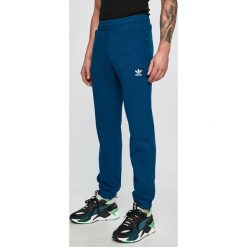 Adidas Originals - Spodnie. Niebieskie spodnie męskie adidas Originals, na co dzień, xl, bez wzorów, z elastanu, casualowe. W wyprzedaży za 179,90 zł.