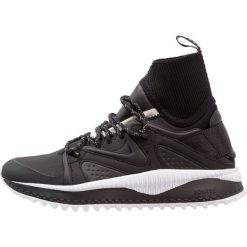 Puma TSUGI KORI Tenisówki i Trampki wysokie black. Czarne trampki męskie Puma, z materiału. W wyprzedaży za 314,50 zł.