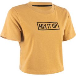 Crop top do tańca miejskiego damski. Pomarańczowe topy damskie DOMYOS, bez wzorów, z elastanu, bez kołnierzyka. Za 59,99 zł.
