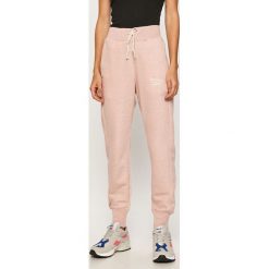 Reebok - Spodnie. Różowe legginsy damskie Reebok, s, bez wzorów, z bawełny. Za 169,90 zł.