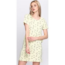Jasnożółta Sukienka Madame Veil. Żółte sukienki damskie Born2be, na lato, xl, bez wzorów, z tkaniny, bez kołnierzyka, bez rękawów. Za 49,99 zł.
