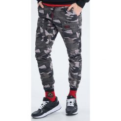 Spodnie slim jogger - Szary. Szare spodnie męskie Cropp, m, bez wzorów. Za 149,99 zł.