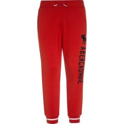 Chinosy chłopięce: Abercrombie & Fitch VARSITY Spodnie treningowe red