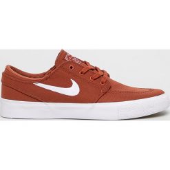 Nike - Tenisówki SB Zoom Janoski Canvas. Pomarańczowe trampki i tenisówki damskie Nike, bez wzorów, z materiału, bez zapięcia. W wyprzedaży za 319,90 zł.