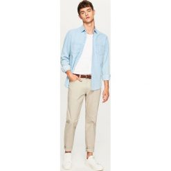 Jeansowa koszula slim fit - Niebieski. Niebieskie koszule męskie marki Reserved, s, z jeansu. Za 99,99 zł.