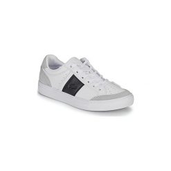 Buty Lacoste COURTLINE 319 1 US. Białe trampki męskie Lacoste, bez wzorów, bez zapięcia. Za 609,00 zł.