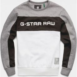 Bluza "Swando" w kolorze szaro-czarnym. Szare bluzy męskie G-Star, m, z nadrukiem, z okrągłym kołnierzem, bez rękawów, bez kaptura. W wyprzedaży za 212,95 zł.
