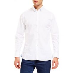 Trussardi Jeans koszula męska 42 niebieski. Niebieskie koszule męskie Trussardi Jeans, m, bez wzorów, z bawełny, bez kołnierzyka, bez rękawów. W wyprzedaży za 259,00 zł.